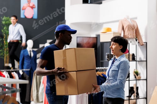 Preview: deliveryman holding carton packages