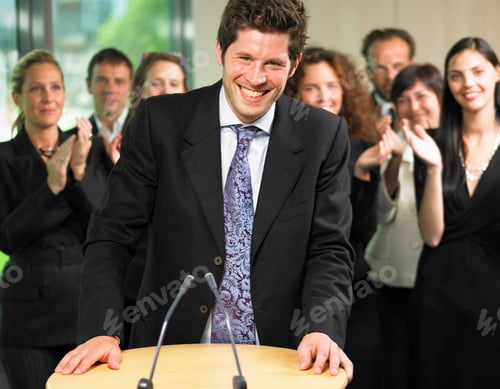 Preview: Business man giving a conference