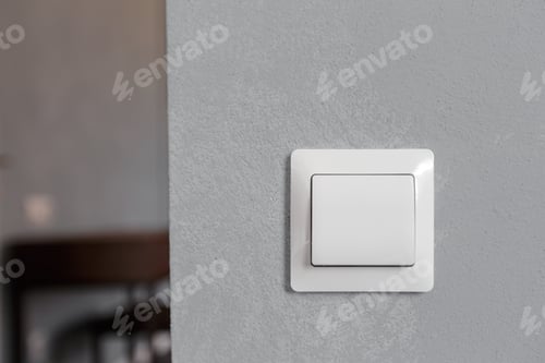 Preview: Modern white light switch on a textured grey wall in a contemporary interior setting