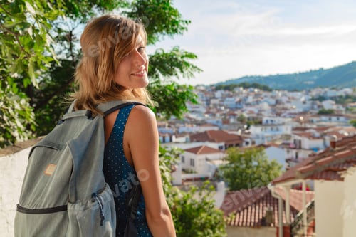 Preview: Woman Tourist Enjoying Walking Down New Discovered Streets On A Mediterranean Town Of Skiathos