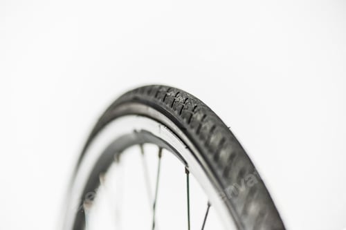 Preview: bicycle wheel with rim, tire and spokes isolated on white
