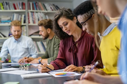 Preview: Business people working together in office