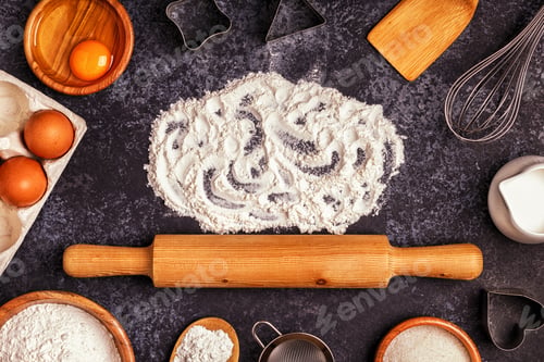 Preview: Ingredients for baking - flour, wooden spoon, rolling pin, eggs