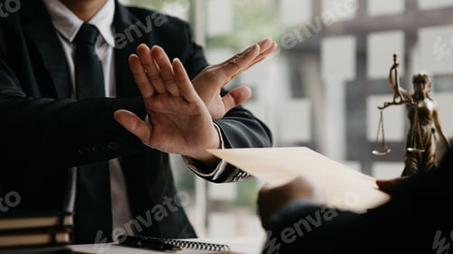 Preview: Business man raised her hand to deny accepting a bribe from a business partner.