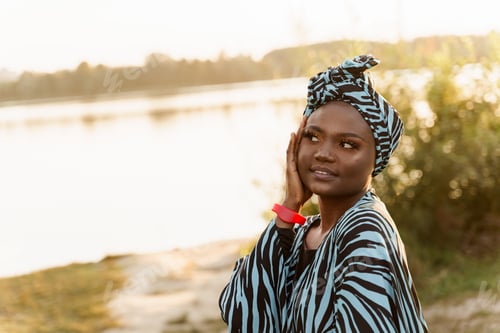 Preview: Close-up Muslim girl in blue hijab smiling, expressive peaceful mood