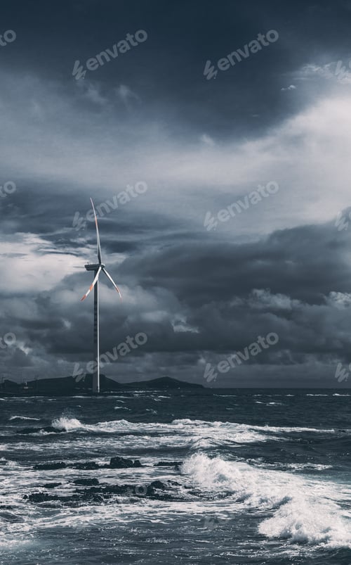 Preview: Scenery of stormy waves and gloomy sky with a lonely wind turbine in the background
