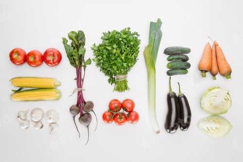 Preview: flat lay with fresh autumn vegetables arranged isolated on white