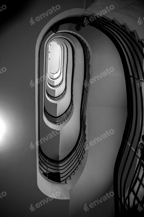 Preview: Black and white photo of old spiral staircase, spiral stairway inside old house in Budapest, Hungary
