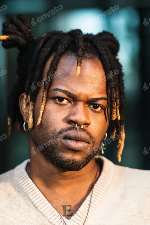 Preview: Modern guy with dreadlocks and in accessories