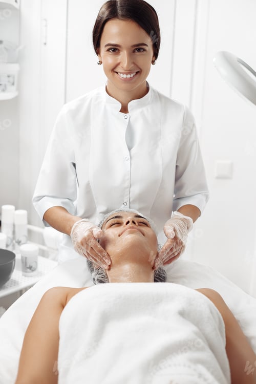 Preview: Woman receiving facial treatment at a medical spa