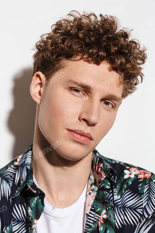 Preview: Image closeup of young handsome man posing and looking at camera