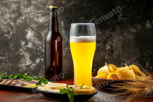 Preview: front view glass of bear with cheese cips and fish on dark background photo snack wine color alcohol