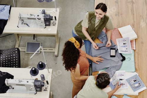 Preview: Group of contemporary seamstresses discussing new fashion collection