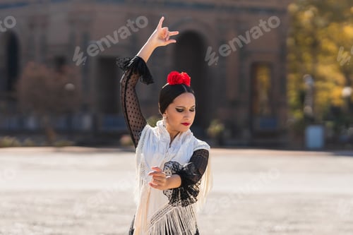 Preview: Spanish woman dancing flamenco outdoors