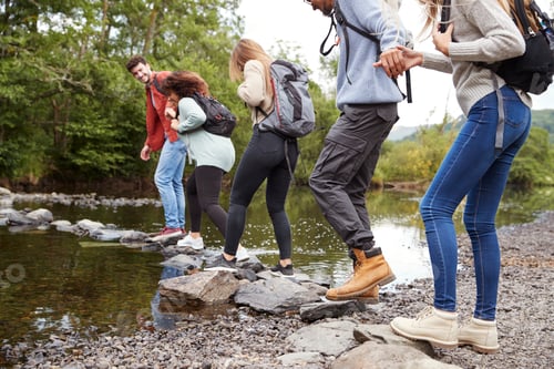 Preview: Multi ethnic group of five young adult friends on a hike