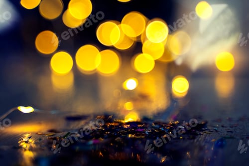 Preview: Abstract background from blurred light in dark background. Holiday and festival party backdrop.