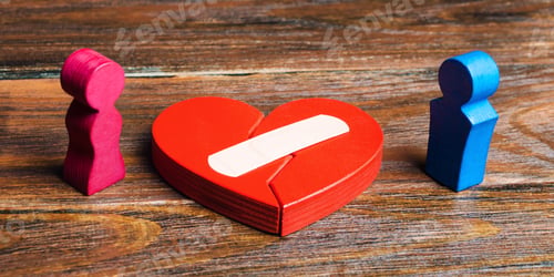 Preview: A red heart with a plaster and couple in lovers
