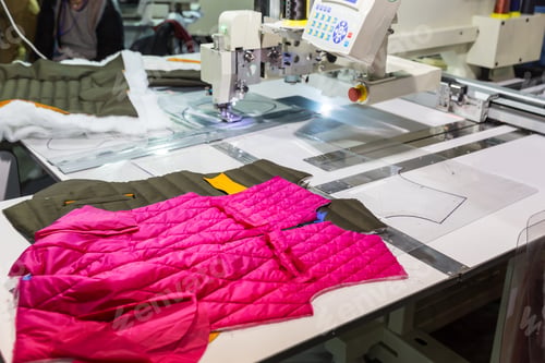 Preview: Sewing machine in cutting shop on clothing factory