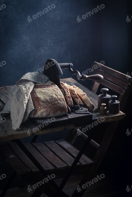 Preview: Tasty loaf of bread on old slicer