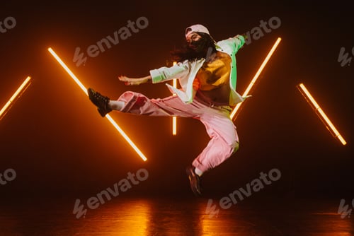 Preview: Hip hop dancer dancing in a cool studio with neon lights.