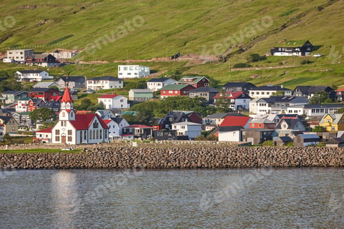 Preview: Sandavagur village shoreline with colorful houses on Faroe islands.