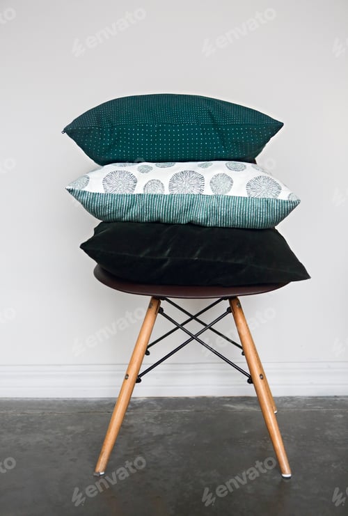 Preview: Green pillows on the chair