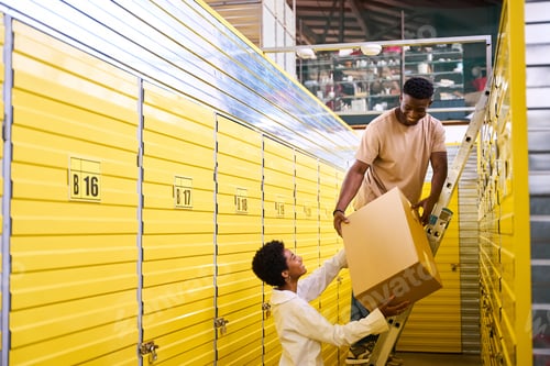 Preview: Young woman gives her boyfriend a cardboard box with things