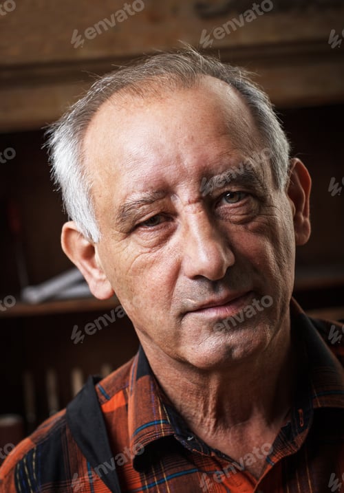 Preview: Portrait of senior carpenter in his workshop.