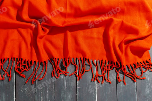 Preview: Red scarf over black wood table background
