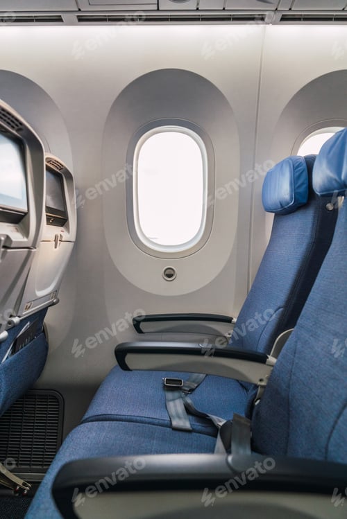 Preview: Aisle in modern plane cabin