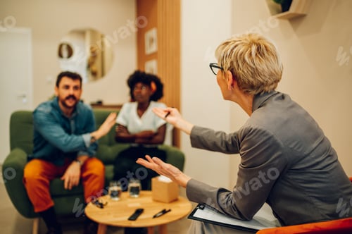 Preview: Diverse couple on a therapy session in a psychologist office