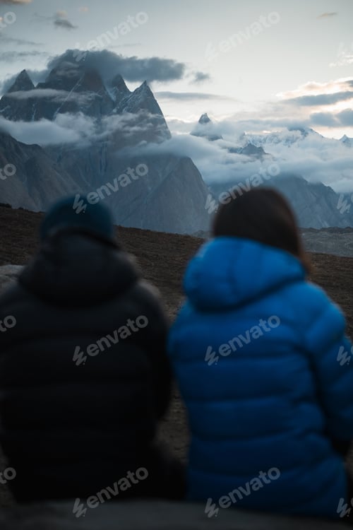 Preview: Trekkers watching spectacular trango towers in karakoram mountains. Paiju koburtse