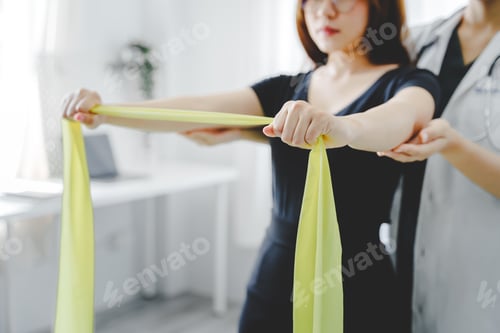 Preview: physical therapist Helping to heal and care for female patients physical therapy concept