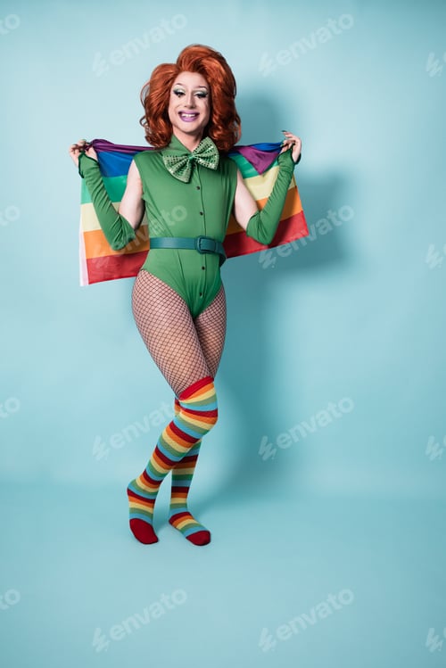 Preview: Drag queen holding lgbt rainbow flag - Focus on face