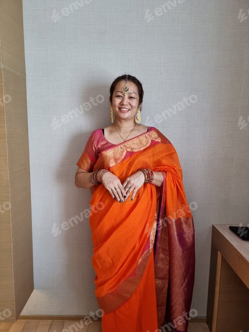 Preview: An Asian woman wearing sari, an Indian woman attire