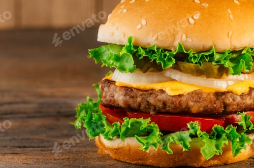 Preview: Homemade hamburger with fresh vegetables Classic deluxe cheeseburger