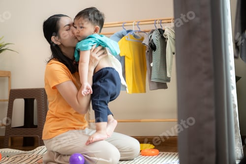 Preview: Mom and little child with taking a shower and dressing at home