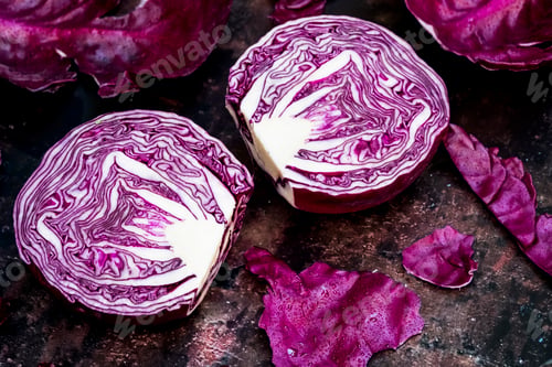 Preview: A raw round red cabbage, cut across the middle.