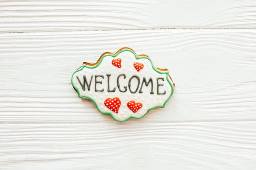 Preview: Delicious key, house, plant,window,heart and welcome sign cookies on white wood