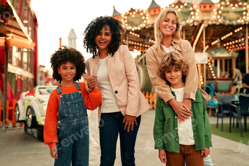 Preview: Kids having fun on a carnival Carousel