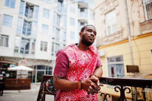 Preview: Black young man wearing african traditional clothes