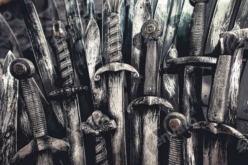Preview: Metal knight swords background. Close up. The concept Knights.