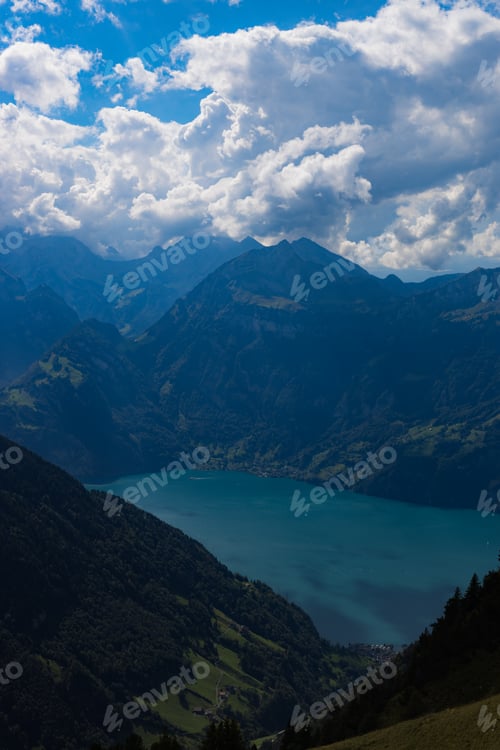 Preview: Beautiful dramatic view of the lake between the mountains.