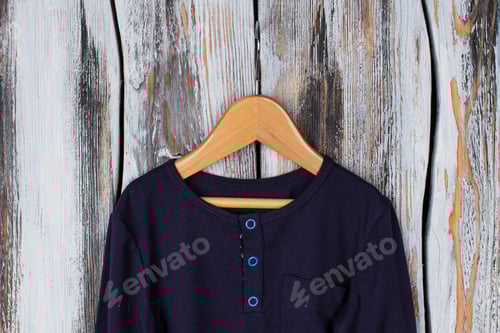 Preview: Navy Shirt on Wooden Hanger with Buttons