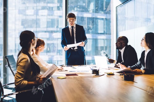 Preview: Multiethnic business partners having meeting at office