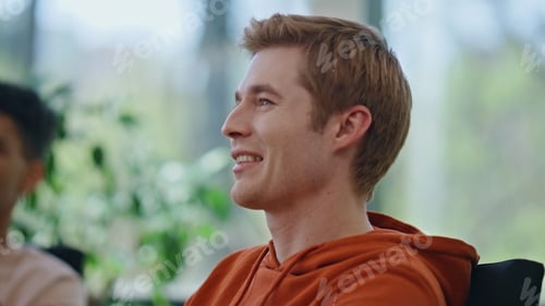 Preview: Smiling manager talking at office break closeup. Coworkers enjoying work pause