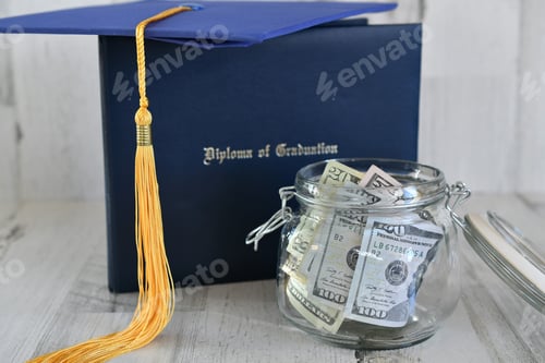 Preview: Graduation cap mortarboard tassel on diploma by a jar of money cash, concept school loans debt
