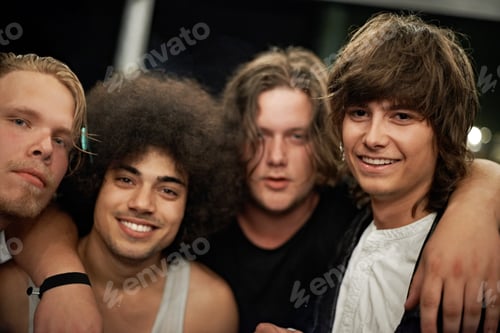 Preview: We came to party. Cropped portrait of four young male friends.