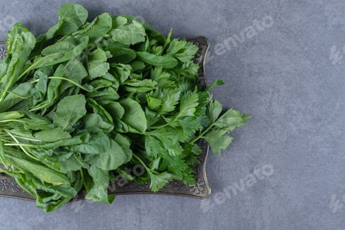 Preview: Fresh watercress on a tray, on the marble background