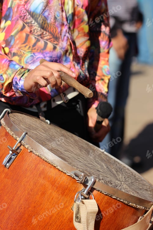 Preview: Close-up shot of man playing drums at music and parades at the t